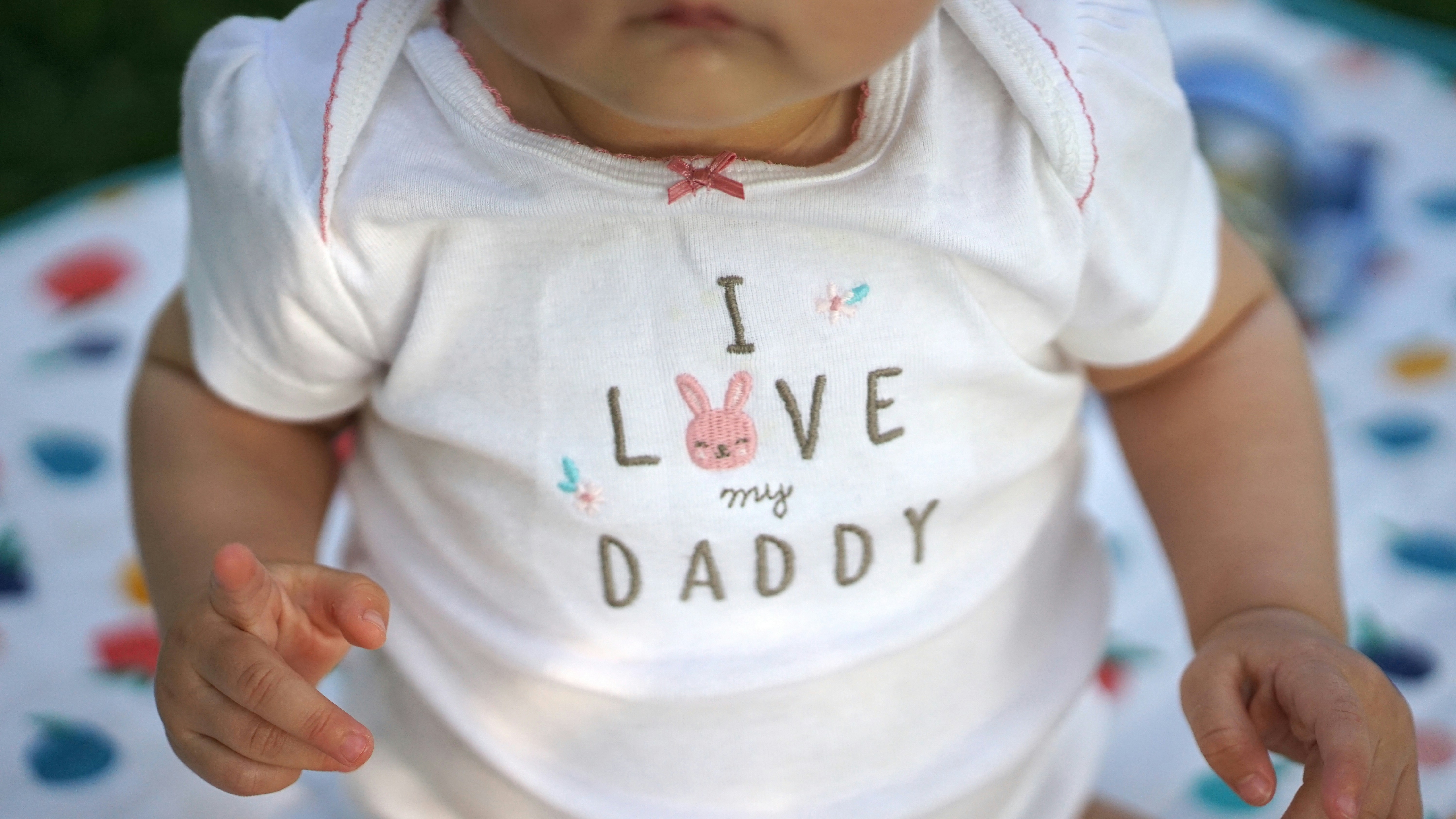 baby in bodysuit